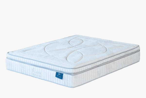 Matelas Latex Deluxe blanc avec surface matelassée et finitions haut de gamme